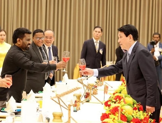 State leader hosts banquet for visiting Sri Lankan President